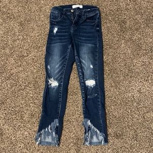 Kancan Signature Skinny jeans, distressed with fringe at the bottom